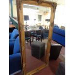 A gilt framed bevelled rectangular mirror