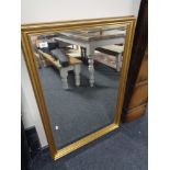 A gilt framed mirror