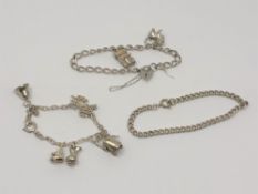 Two silver charm bracelets and another bracelet CONDITION REPORT: 38.
