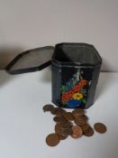 A tin of coins - one pence pieces etc