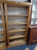 A pine open bookcase