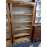 A pine open bookcase