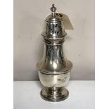 A large silver sugar caster