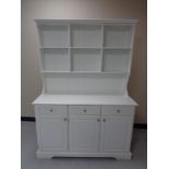 A painted traditional style dresser