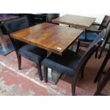 A cafe table together with a pair of wooden chairs (3)