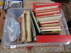 A large box of stamps and albums