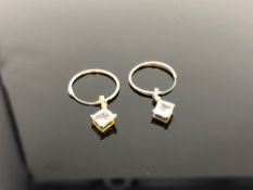 A pair of yellow gold aquamarine earrings