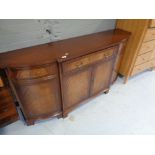 A reproduction mahogany sideboard