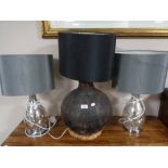 A decorative table lamp together with a pair of silvered table lamps (3)