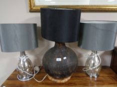 A decorative table lamp together with a pair of silvered table lamps (3)