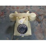 An early twentieth century cream telephone