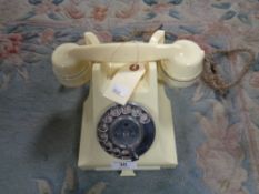 An early twentieth century cream telephone