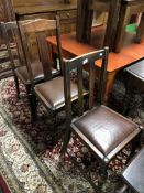 Three oak dining room chairs
