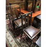 Three oak dining room chairs