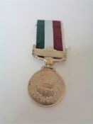 An Eastern medal on ribbon
