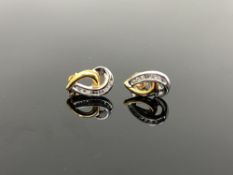 A pair of 10ct two-tone gold diamond earrings