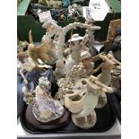 A tray of decorative ornaments and figures
