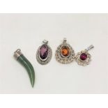 Four silver gemstone pendants