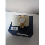 A Gent's gold plated Raymond Weil wrist watch in box