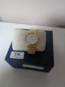 A Gent's gold plated Raymond Weil wrist watch in box