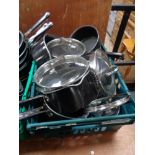 A crate of Jamie Oliver pans and cooking ware