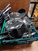 A crate of Jamie Oliver pans and cooking ware