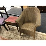 A gold loom armchair and piano stool