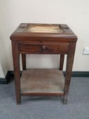 A Victorian mahogany stand fitted a drawer and undershelf
