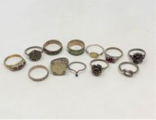 Twelve various silver rings
