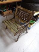 A metal and wooden garden armchair