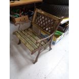 A metal and wooden garden armchair