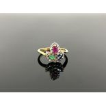 A 10ct gold ruby, sapphire, emerald and diamond set ring,