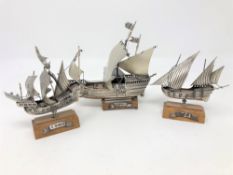 Three Italian silver models of sailing ships on wooden plinths,