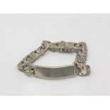 A heavy textured silver identify bracelet, length 20cm CONDITION REPORT: 65.