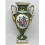 A French gilt and hand-painted porcelain twin handled vase