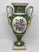 A French gilt and hand-painted porcelain twin handled vase