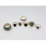 Five silver stone set rings,