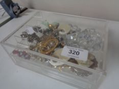 A jewellery box of brooches,