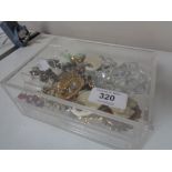 A jewellery box of brooches,