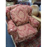 A reproduction Victorian style armchair in burgandy fabric