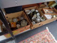 Three boxes of ceramics, glass ware, cutlery,