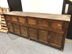 A large antique pine proving cabinet, length 260 cm x depth 60 cm x height 100 cm.