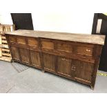 A large antique pine proving cabinet, length 260 cm x depth 60 cm x height 100 cm.