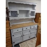 A painted traditional style dresser