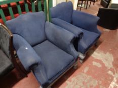 A pair of blue upholstered antique style armchairs