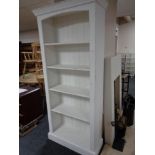 A painted wooden bookcase
