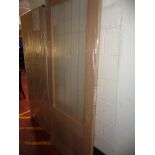 A light oak hardwood interior glazed door (new)