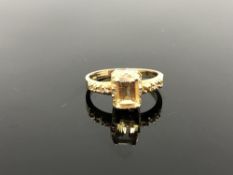 A 10ct gold citrine and diamond ring,