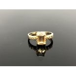 A 10ct gold citrine and diamond ring,