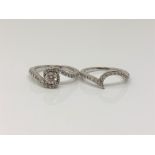 Two 18ct white gold diamond set rings - Brilliant cut four claw diamond mounted in a swirl of